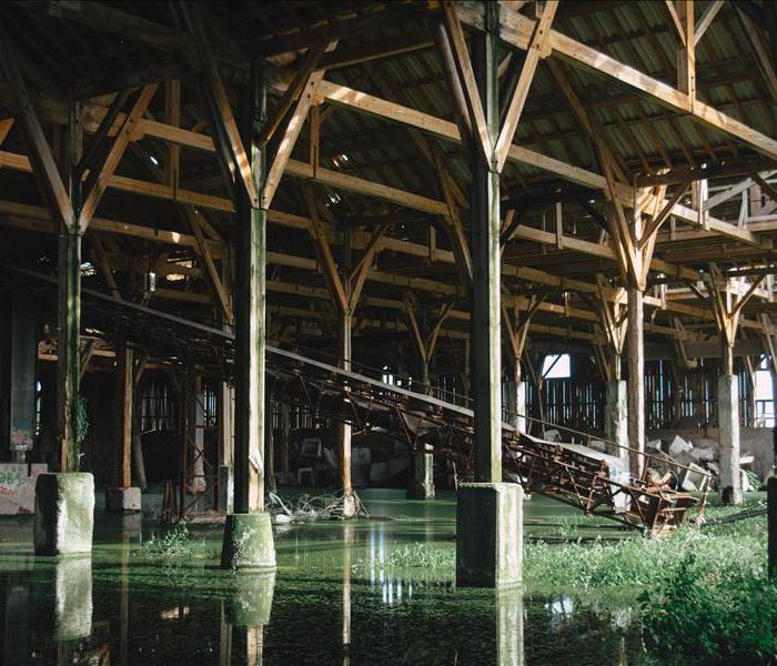 Water floods a warehouse