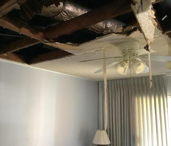 house ceiling caved in due to fire in an attic