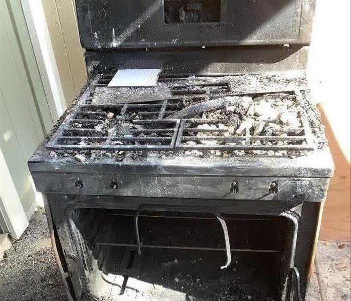 Stove that caught fire completely burnt and chard